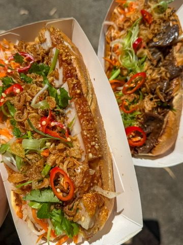 Two Banh Mi rolls outdoors